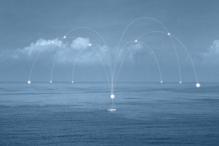 Network and connection technology concept yacht in open sea. Global network concept on sea. Yacht on the sea horizon, seascape. Blue toning.の写真素材