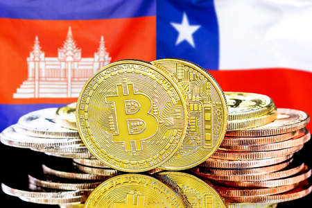 Concept for investors in cryptocurrency and Blockchain technology in the Cambodia and Chile. Bitcoins on the background of the flag Cambodia and Chile.の写真素材