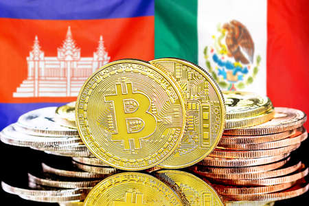 Concept for investors in cryptocurrency and Blockchain technology in the Cambodia and Mexico. Bitcoins on the background of the flag Cambodia and Mexico.の写真素材