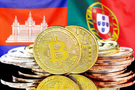 Concept for investors in cryptocurrency and Blockchain technology in the Cambodia and Portugal. Bitcoins on the background of the flag Cambodia and Portugal.の写真素材