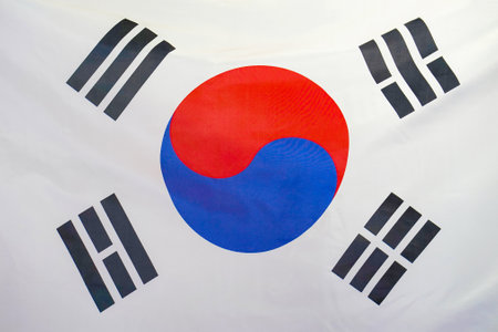 Fabric texture flag of South Korea. Flag of South Korea waving in the wind. South Korea flag is depicted on a sports cloth fabric with many folds. Sport team bannerの写真素材