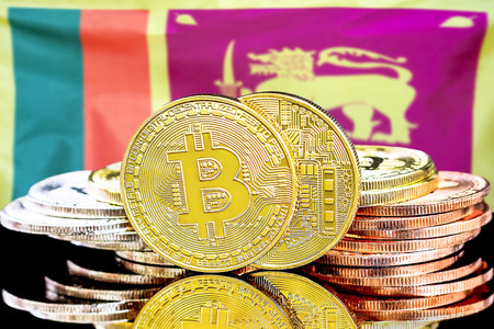 Concept for investors in cryptocurrency and Blockchain technology in the Sri Lanka. Bitcoins on the background of the flag Sri Lanka.の写真素材