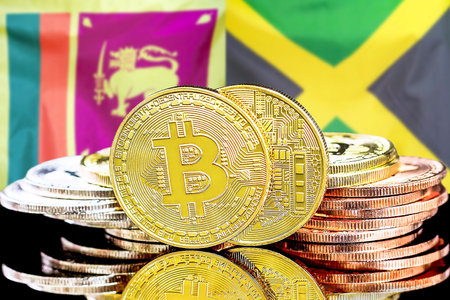 Concept for investors in cryptocurrency and Blockchain technology in the Sri Lanka and Jamaica. Bitcoins on the background of the flag Sri Lanka and Jamaica.の写真素材