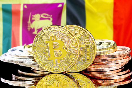 Concept for investors in cryptocurrency and Blockchain technology in the Sri Lanka and Belgium. Bitcoins on the background of the flag Sri Lanka and Belgium.の写真素材