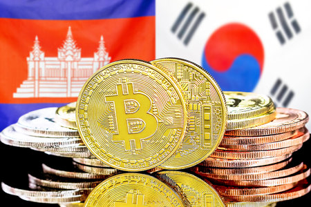 Concept for investors in cryptocurrency and Blockchain technology in the Cambodia and South Korea. Bitcoins on the background of the flag Cambodia and South Korea.の写真素材