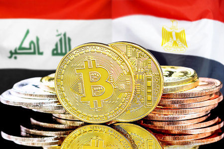Concept for investors in cryptocurrency and Blockchain technology in the Iraq and Egypt. Bitcoins on the background of the flag Iraq and Egypt.の写真素材