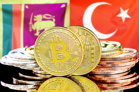 Concept for investors in cryptocurrency and Blockchain technology in the Sri Lanka and Turkey. Bitcoins on the background of the flag Sri Lanka and Turkey.の写真素材