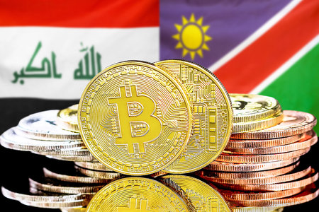 Concept for investors in cryptocurrency and Blockchain technology in the Iraq and Namibia. Bitcoins on the background of the flag Iraq and Namibia.の写真素材