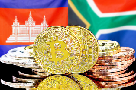 Concept for investors in cryptocurrency and Blockchain technology in the Cambodia and South Africa. Bitcoins on the background of the flag Cambodia and South Africa.の写真素材