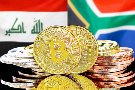 Concept for investors in cryptocurrency and Blockchain technology in the Iraq and South Africa. Bitcoins on the background of the flag Iraq and South Africa.の写真素材
