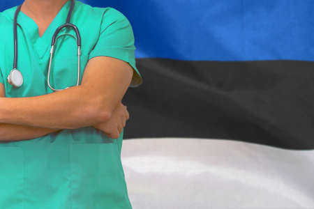 Male surgeon or doctor with stethoscope on the background Estonia flag. Health care and medical concept. Surgery concept in Estoniaの写真素材
