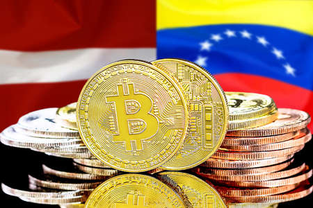 Bitcoins on the background of flag Latvia and Venezuela. Concept for investors in cryptocurrency and Blockchain technology in Latvia and Venezuelaの写真素材