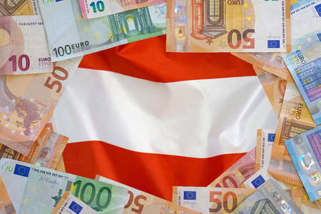 Mockup of Euro banknotes on flag Austria background. Different Euro banknotes frame. Business, finance, investment, saving and corruption concept of Europeの写真素材