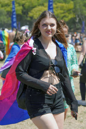 Portrait of lesbian in the Gay Pride parade. The annual LGBT parade. parade of tolerance. Rainbow flags at gay pride parade. 10 June 2022. Tel Aviv. Israelのeditorial素材