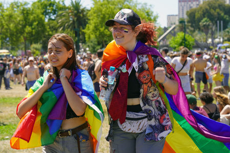 Portrait of two lesbians in the Gay Pride parade. The annual LGBT parade. parade of tolerance. Rainbow flags at gay pride parade. 10 June 2022. Tel Aviv. Israelのeditorial素材