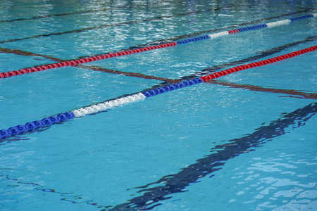 Lanes of a competition swimming pool. Empty swimming pool with lanesの写真素材