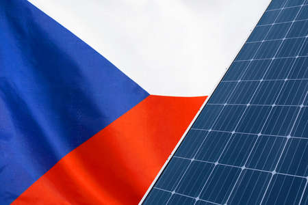 Solar panels against flag Czech Republic background. Solar battery generates a pure electricity. Concept of sustainable resources and renewable energy in the Czech Republicの写真素材