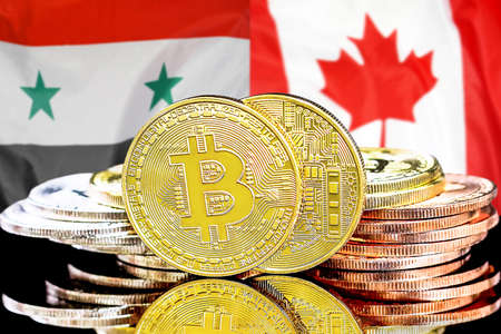 Bitcoins on flag Syria and Canada background. Concept for investors in cryptocurrency and Blockchain technology in Syria and Canadaの写真素材