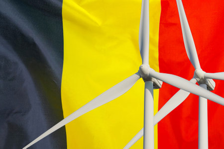 Two Wind Turbines for alternative energy on Belgium flag background. wind turbines generating...