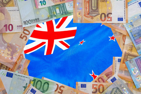 Mockup of Euro banknotes on flag New Zealand background. Different Euro banknotes frame. Business, finance, investment, saving and corruption concept of New Zealandの写真素材