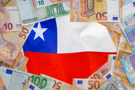Mockup of Euro banknotes on flag Chile background. Different Euro banknotes frame. Business, finance, investment, saving and corruption concept of Chileの写真素材