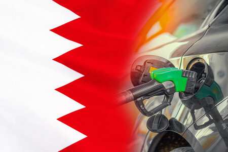Car with a fuel injector on Bahrain flag background. Record fuel prices for population. Gasoline price increase during energy and fuel world crisis in Bahrainの写真素材