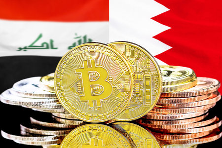 Bitcoins on flag Bahrain and Iraq background. Concept for investors in cryptocurrency and Blockchain technology in Bahrain and Iraqの写真素材