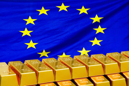 Row of shining golden bullions on the EU flag background. Business and financial country's reserves. Concept of gold reserve and gold fund of European Unionの写真素材