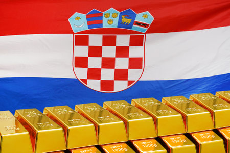 Row of shining golden bullions on flag of Croatia background. Business and financial country's reserves. Concept of gold reserve and gold fund of the Republic of Croatiaの写真素材