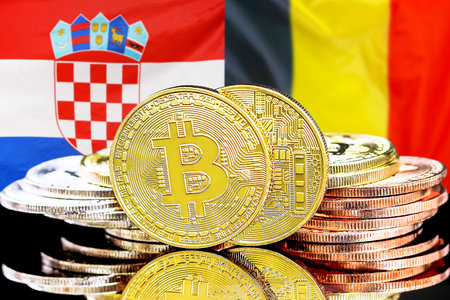 Bitcoins on flag of Croatia and Belgium background. Concept for investors in cryptocurrency and Blockchain technology in Croatia and Belgiumの写真素材