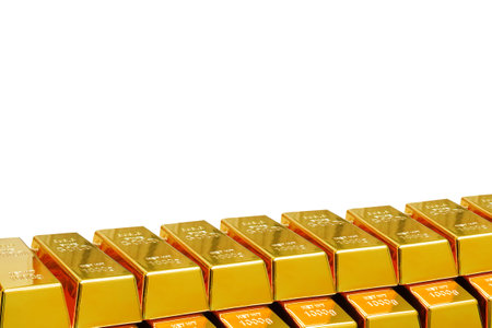 Row of shining golden bullions isolated on white background. Gold bars isolated on white background. Financial conceptの写真素材