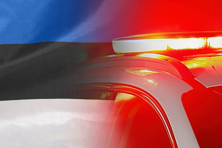 Close-up of the red lights on top of Estonia police vehicle on flag of Estonia background. The concept of crime and law in Estoniaの写真素材