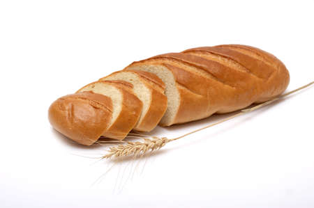 Bread and wheat on a white backgroundの写真素材