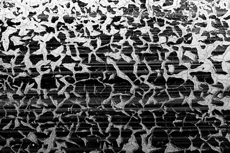 Old striped paint cracking and cracked .Black and white .の写真素材