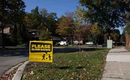 Road signs in US and Canada.Street name sign on the road background.Warm autumn on the street.Bike...