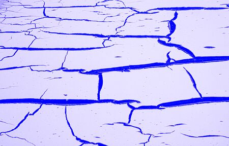 Old cracked colourfull paint textured background.City life and neighbourhood.Old pained window.Dried...