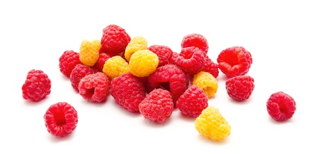 Heap of red and yellow raspberry isolated on a white backgroundの写真素材