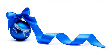 Blue christmas ball with ribbon isolated on a white backgroundの写真素材