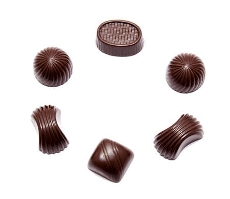 Assortment of chocolate candies isolated on a white background