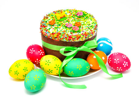 Decorated easter cake and eggs isolated on a white backgroundの写真素材