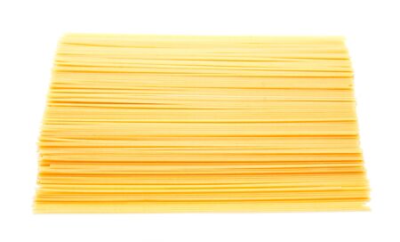 Uncooked Italian spaghetti isolated on a white backgroundの写真素材