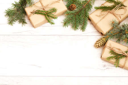 Merry Christmas frame and wallpaper. Happy New Year composition. Christmas gift, pine cones, fir...