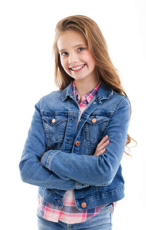Portrait of adorable smiling little girl child isolated on a white backgroundの写真素材