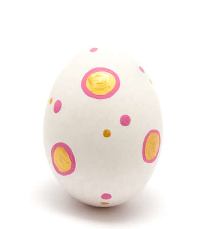Colorful perfect handmade painted easter egg isolated on a white background closeupの写真素材