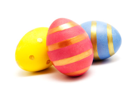 Colorful handmade painted easter eggs isolated on a white background closeupの写真素材