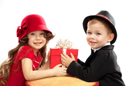 Little boy giving girl gift  Present for a birthday, valentine s day, birthday or other holiday ...