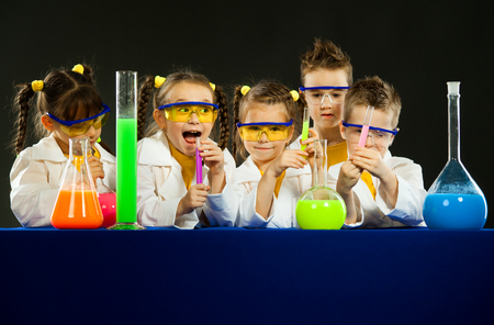 Group funny kids in the laboratory. Science and education in labの写真素材