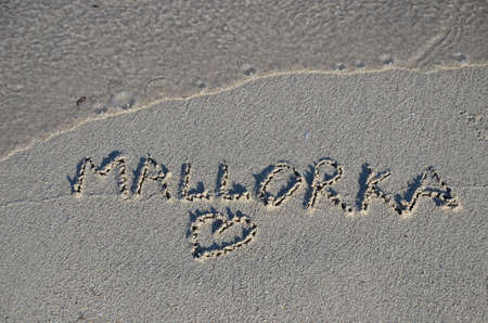 Writing at sand, Mallorkaの写真素材