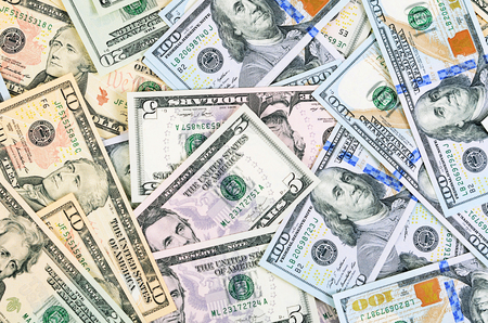 The dollar banknotes as a background close-up