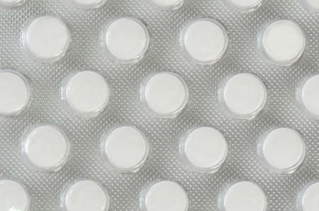 Tablets in packing by close-up. Medical background